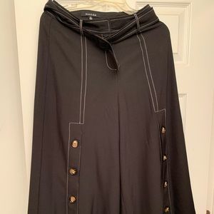 Dress pants with buckle on hips.